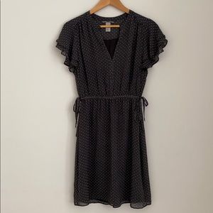 Beautiful black and white dress.